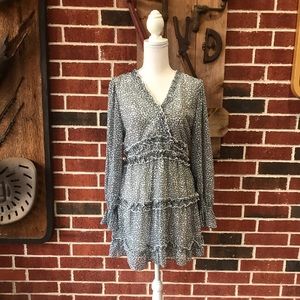 White Dress with Black Accents and Ruffle Details